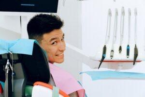 Happy Patient in a Dental chair